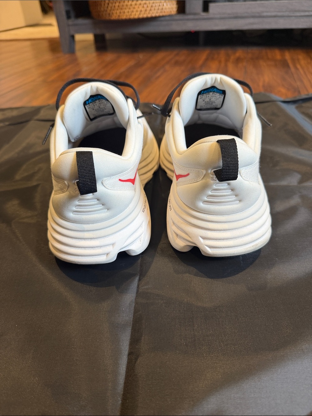 Hoka One One White Sneakers with Blue Logo